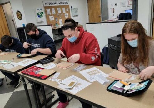 Students studying at the APCs vet assistant school.